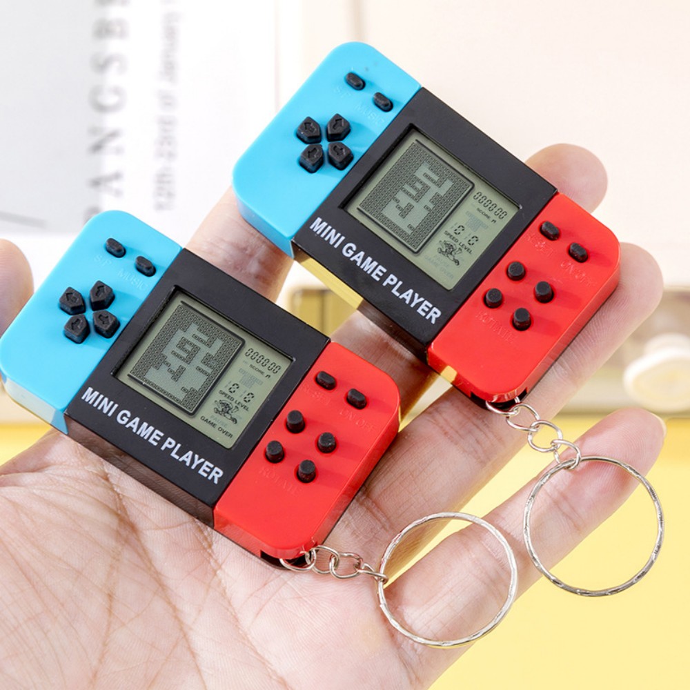 سلسلة مفاتيح على شكل وحدة تحكم - مراجعة Retro Gaming System وسعره